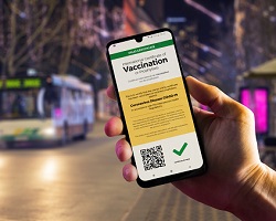 smartphone displaying COVID-19 vaccination certificate